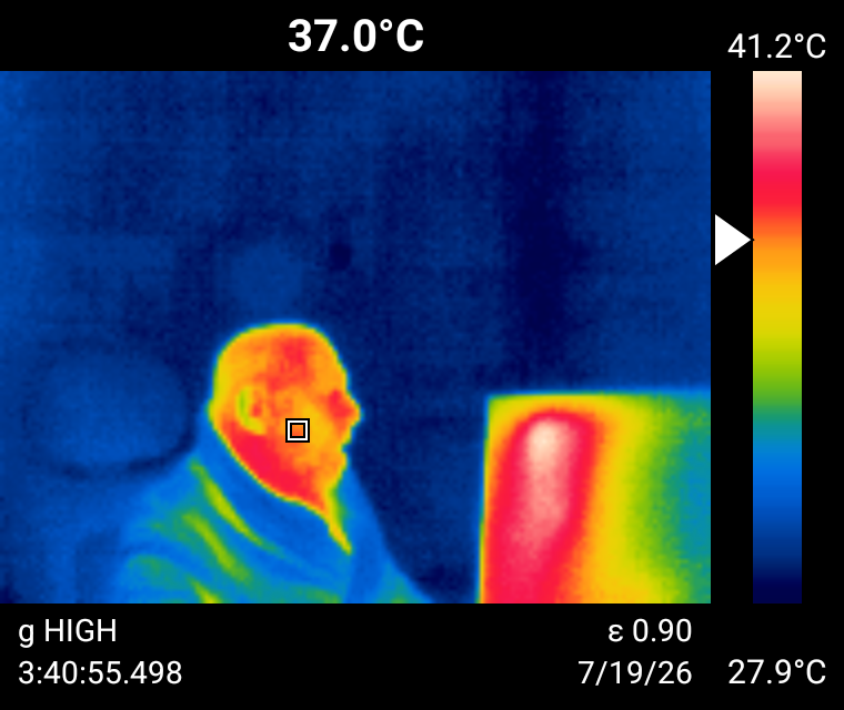 Exported thermal image composite with color bar, spotmeter marker, and capture metadata footer
